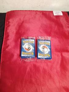 lot 163 image: 2 Unopened packs of Pokemon trading cards