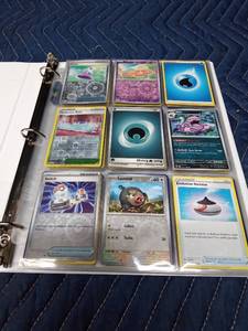 lot 105 image: Binder of 90 Pokemon trading cards