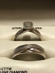 lot 91 image: Sterling Silver wedding rings with diamonds
