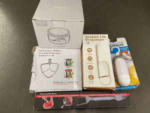 lot 46 image: Ecoco Kitchen Attachments Bundle Watermelon Dicer, Beater, Lid Organizers, Bag Sealer - Lot of 5