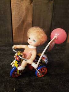 lot 35 image: Vintage Very Cool Tin Toy Tricycle with Little Girl - MTU Korea