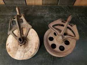 lot 58 image: 2 Antique Pulley Wheels one Wooden wheel &amp one Metal Wheel