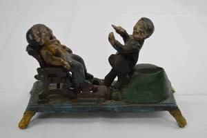 lot 82 image: Mid-Century Cast Iron Mechanical Dentist and Patient