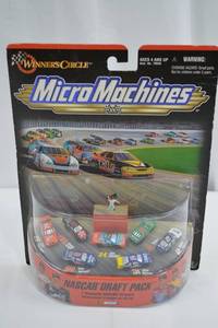 lot 87 image: Micro Machines NASCAR Draft Pack - 7 Cars on Circular Track (Winners Circle)