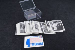 lot 116 image: The Avengers Photo Still Collection - Vintage B&W Stills With Promo Card & Box
