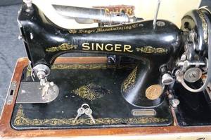 lot 60 image: Singer Vintage Sewing Machine with Built-In Motor in Case - Black Enamel with Gold Filigree