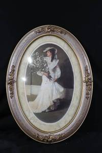 lot 80 image: Home Interiors & Gifts Oval Portrait Frame - Vintage Woman with Bouquet Print