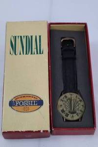 lot 153 image: Fossil Sundial Watch - Gold-Tone Dial, Black Leather Strap