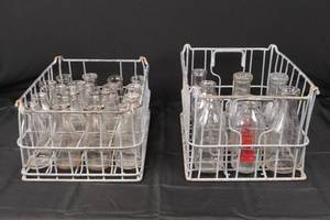 lot 202 image: Vintage Carnation Milk Glass Bottles in Wire Crates - Embossed Dairy Bottles, Assorted Sizes