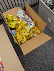 lot 53 image: Large Box of Balloons with Strings - Lot of Smiley Faces