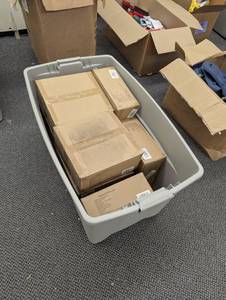 lot 57 image: Huge Bin of Christmas - Light Up Socks