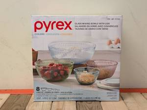lot 61 image: PYREX COLORS GLASS MIXING BOWLS WITH LIDS 8PC.