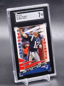 lot 132 image: 2008 Topps Tom Brady Tribute Football Card #TBT-TB14 SGC 7