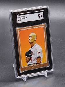 lot 80 image: 2010 Topps 206 Cal Ripken Jr Bronze Baseball Card #84 SGC 9