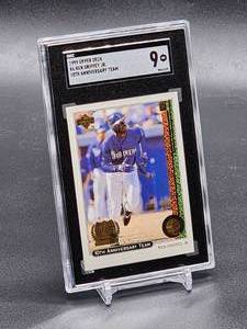 lot 111 image: 1999 Upper Deck Ken Griffey Jr Baseball Card #X6 SGC 9