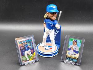 Vladimir Guerrero Bobblehead with a Limited 6999 2021 Topps Baseball Card and a 2023 Topps Chrome Baseball Card
