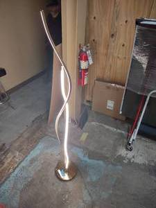 lot 6 image: Jonathan Y Cairo Intergrated Contemporary Gold Stick Floor Lamp