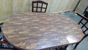 lot 30 image: Dark wood Dining Table wtih 4 wood and upholstered chairs