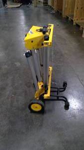 lot 64 image: Dewalt heavy duty rolling table saw stand