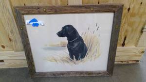 lot 94 image: Rustic wood and bullet casing framed black lab painting 27x23