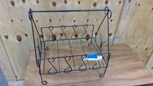 lot 123 image: Vintage black wire magazine rack