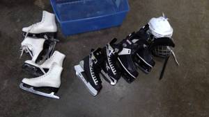 lot 163 image: Tote with two pairs of hockey skates, 2 pairs of figure skates, and hockey helmet