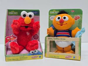 lot 194 image: 2 Brand New Sesame Street Toys - Elmo &amp Ernie