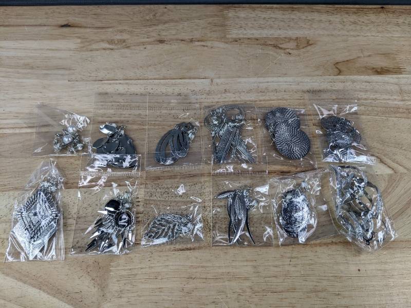 lot 583 image: Lot of 12 New Silver-Tone Clip-On Earrings Pairs