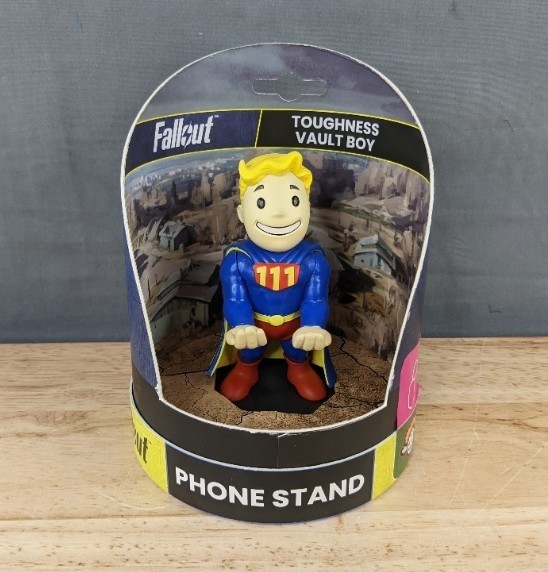 lot 144D image: Fallout Vault Boy Phone Stand - Brand New
