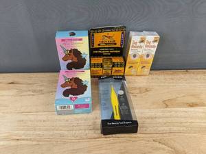 lot 185 image: 14 Afro Unicorn Bandages & Tiger Balm Ultra Strength Pain Relieving Ointment & Tweezerman Tweezers - Brand New