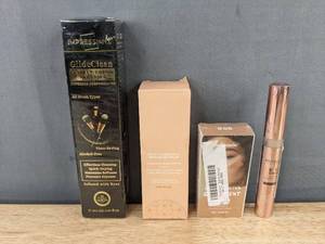 lot 515 image: Impressions GlideClean Brush Cleaner, ZPUF Foundation, Moisturizing Serum and Revolution Eye Bright Concealer - Brand New