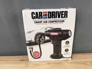 lot 71Q image: Car and Driver Smart Air Compressor - 12V Portable Inflator - Retail $50.00 - Brand New