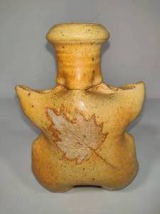 lot 43 image: Torso Shaped Pottery Vase