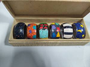 lot 102 image: Set of Vintage Hand Painted Napkin Rings in Case