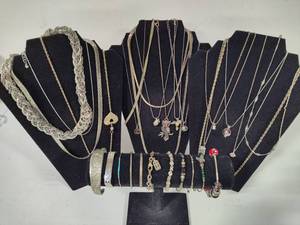 lot 100 image: Huge Lot of Silver Tone Jewelry
