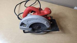 lot 2 image: Black & Decker CS1000 11 Amp Circular Saw