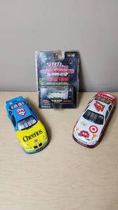 lot 10 image: Racing Champions Mint Die Cast Collectibles including 1937 Ford Convertible, Cheerios #43 Pontiac, and Target #41 Dodge