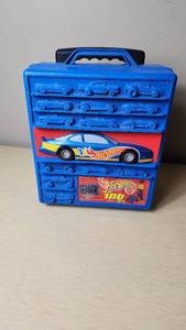 lot 18 image: Hot Wheels Mattel 100-Car Carrying Case with Telescoping Handle and Wheels