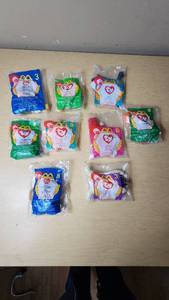 lot 25 image: Ty Beanie Babies McDonalds Happy Meal Toys including Nuts the Squirrel, Spooky the Ghost, Snort the Bull, and others