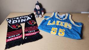 lot 54 image: Arizona Cardinals Scarf, Chicago Bears Plush, and Lakers Jersey