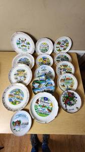 lot 76 image: State-themed decorative plates including Ohio, New Mexico, Mississippi, California, Florida, and others