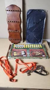 lot 83 image: Nathans Reversible Stovetop Grill & Griddle, Wooden Spoon Rack, and Dog Chain with Leash