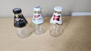 lot 156 image: Miller Genuine Draft and High Life Beer Bottles
