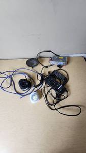 lot 177 image: Security Camera, Power Supply, Remote Control, and Cables