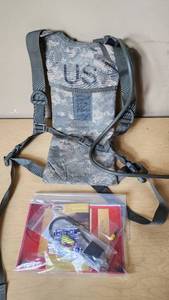 lot 185 image: Hydration Pack and Firearms Safety Kit including Laser Lite Ear Plugs and Gun Lock