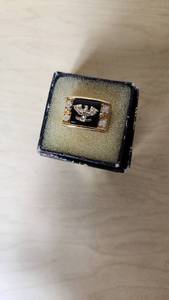 lot 196 image: Gold Ring with Eagle Design and Stones Inside Marked 14kt