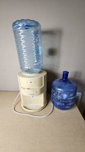 lot 231 image: Polar Water Dispenser with Bottles