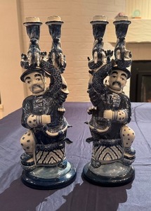 lot 21 image: Pair of Vintage Chinese Figural Serpentine Blue and White Ceramic Candle Holders