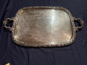 lot 50 image: Vintage Silver-Plated Serving Tray with Ornate Handles and Scroll Work