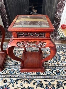 lot 5 image: Vintage Chinese Wooden Side Table with Ornate Carved Details, Curved Legs and a Glass Inlay 1980s (10 x 10 x 18.5 Tall)